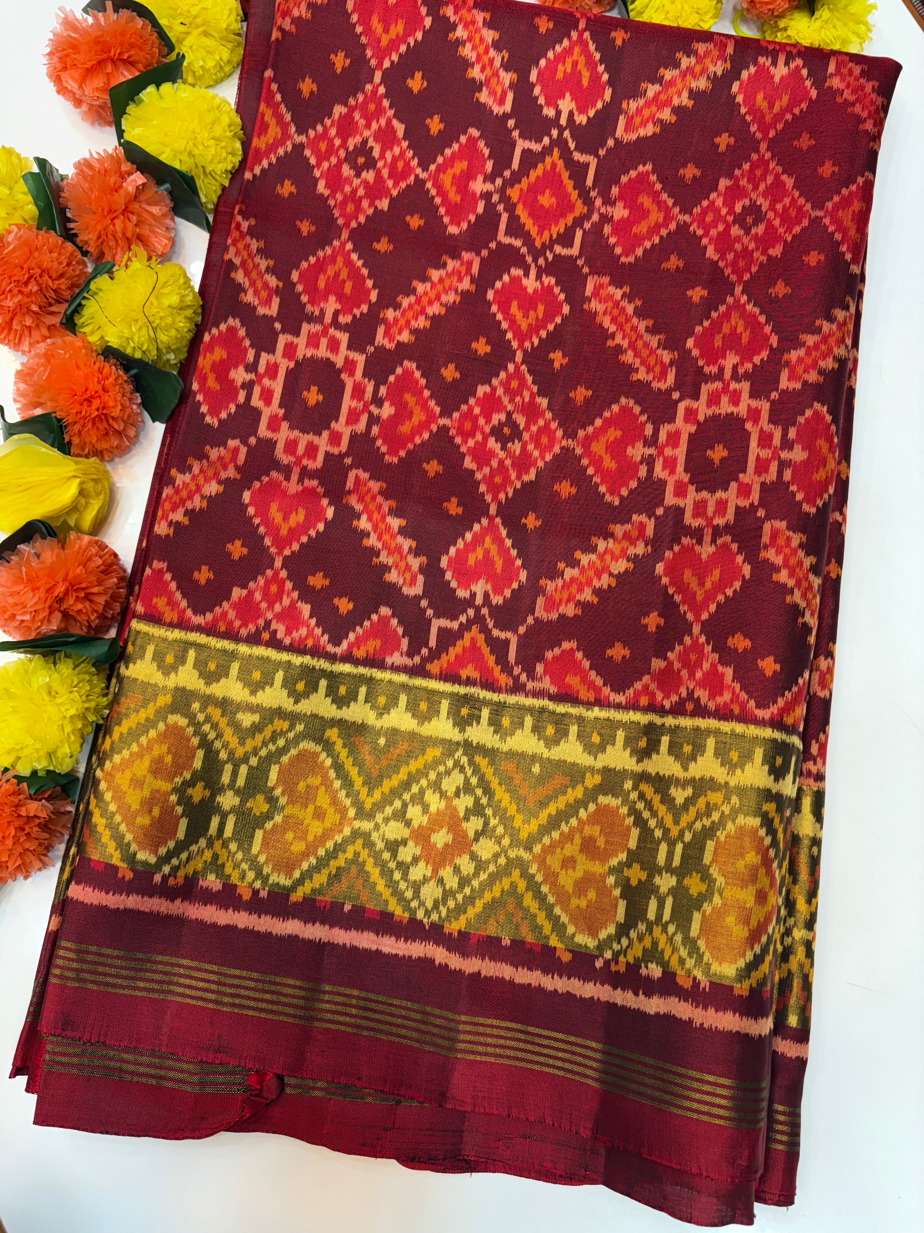 Manekchok self maroon rajkoti patola saree