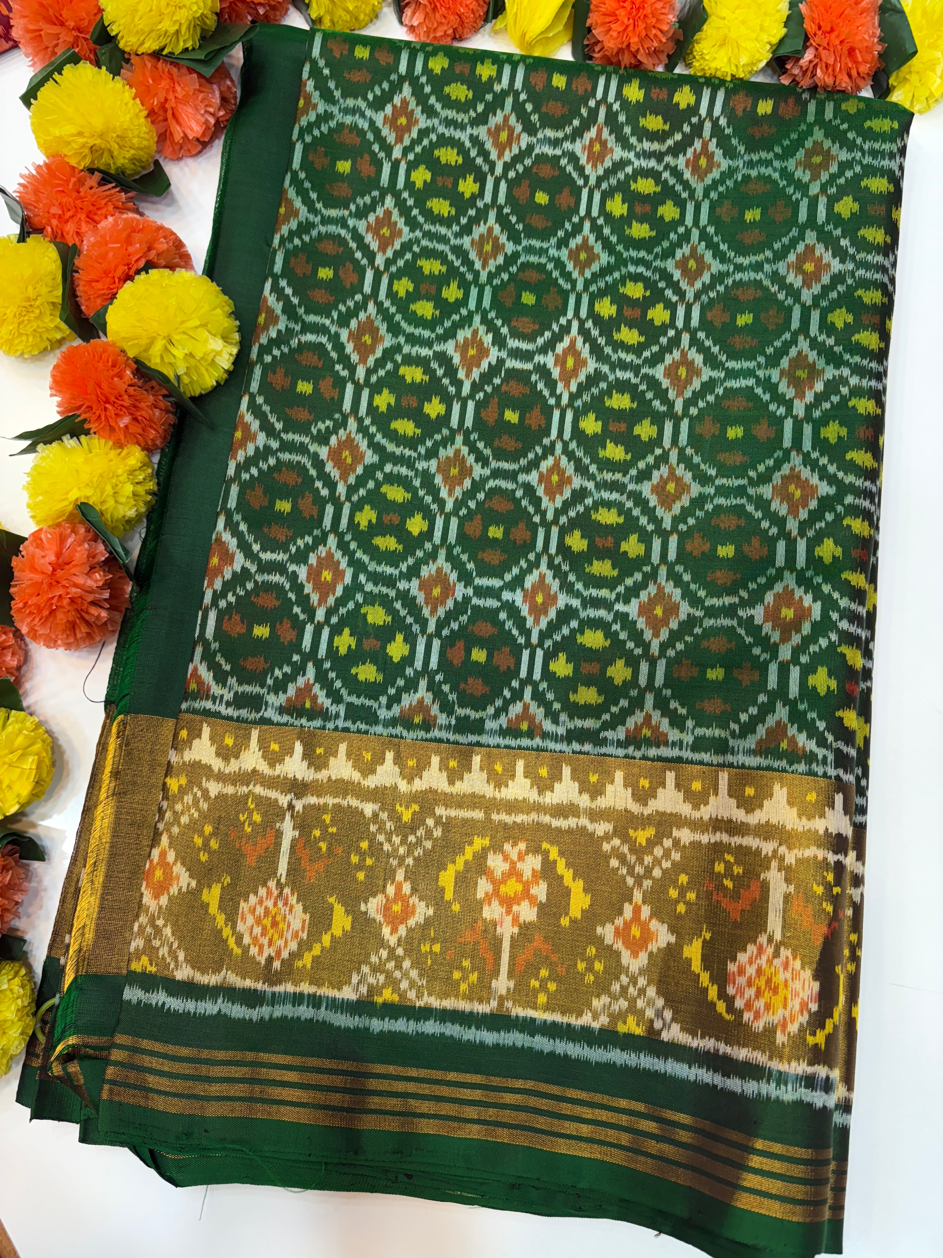 Fancy batanfull design self green rajkoti patola