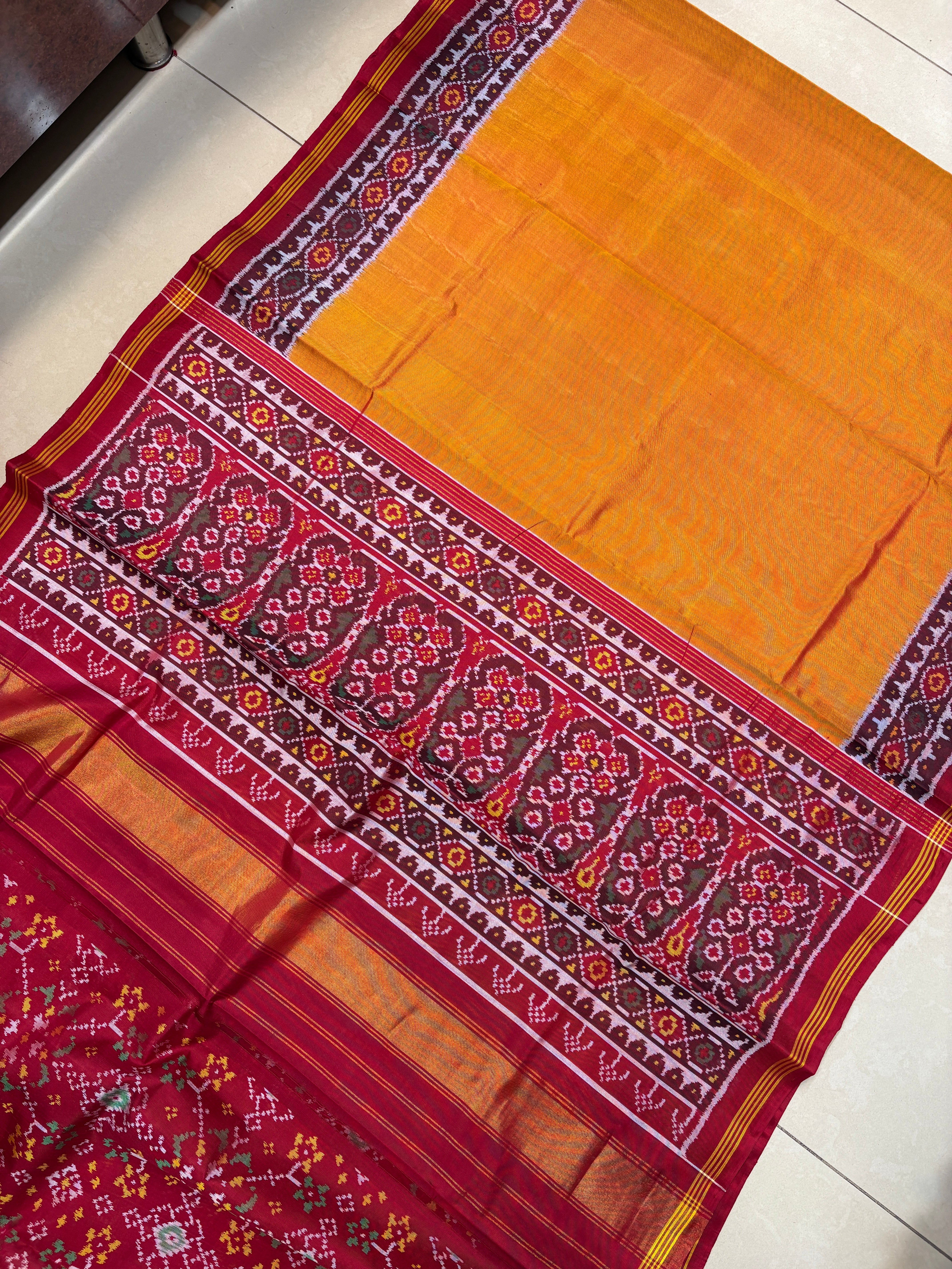 Musturd orange gada bodar patola saree