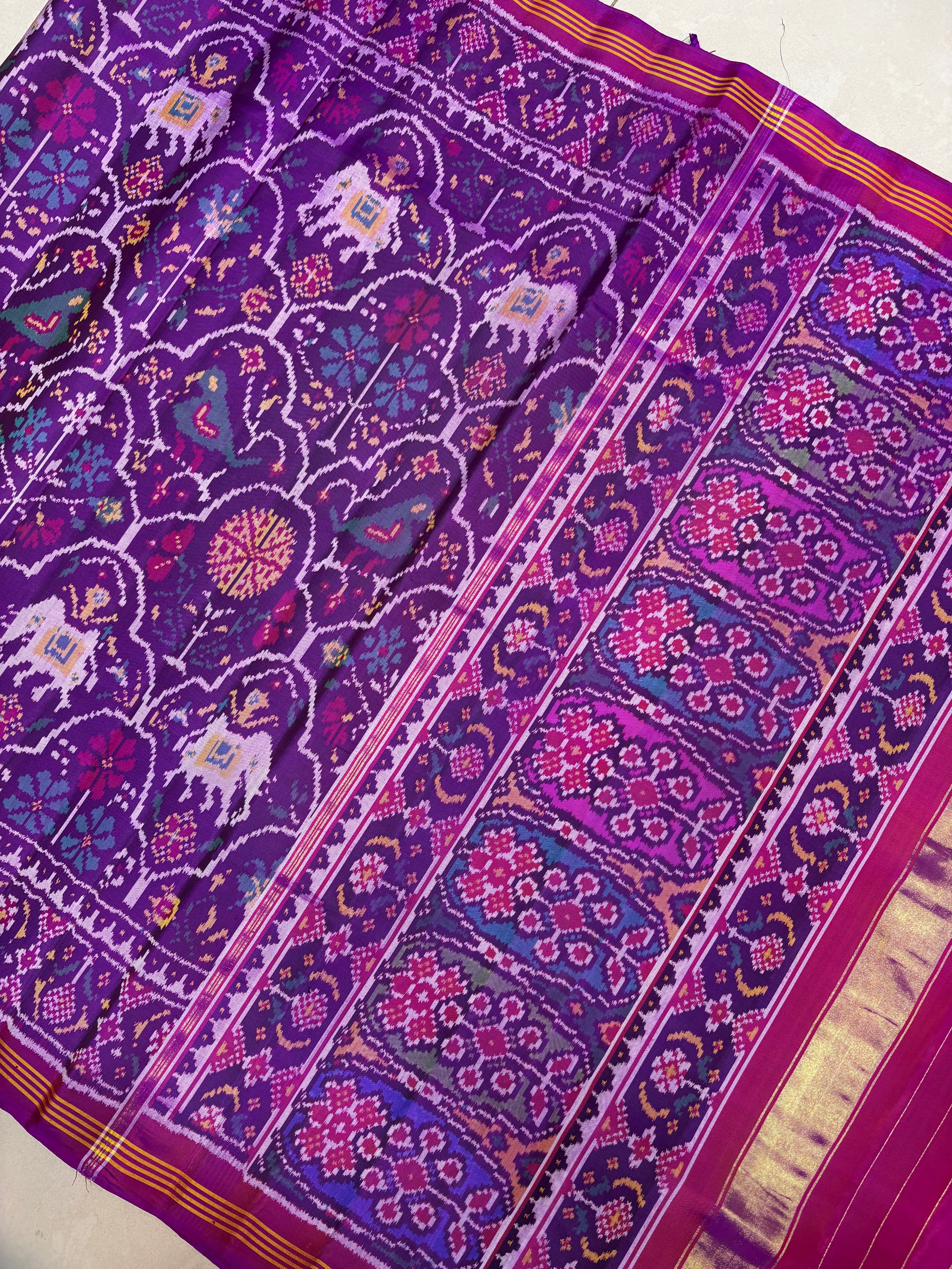Fusion figures singke ikkat patola saree