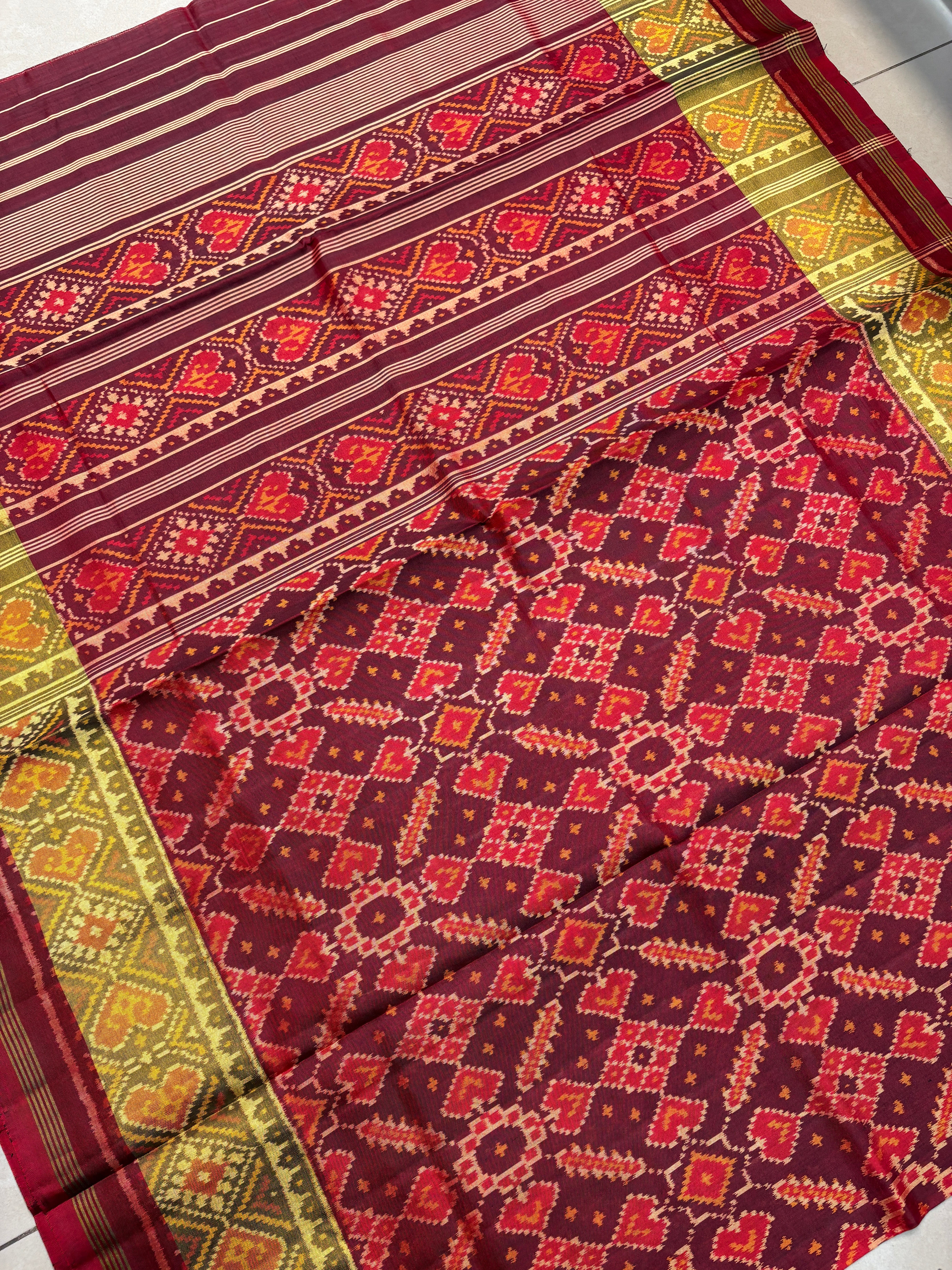 Manekchok self maroon rajkoti patola saree