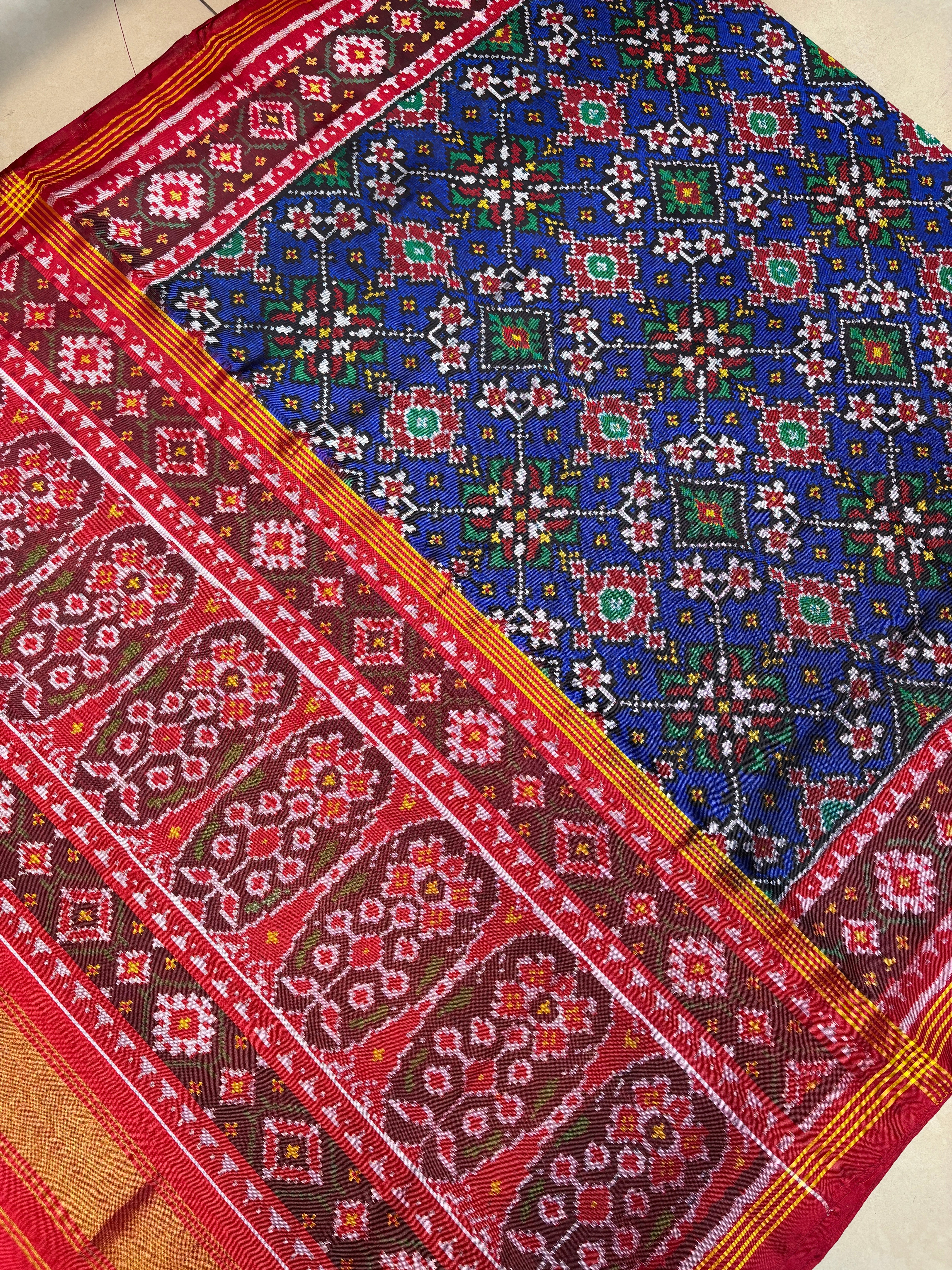 Blue red traditional navratan design patola saree