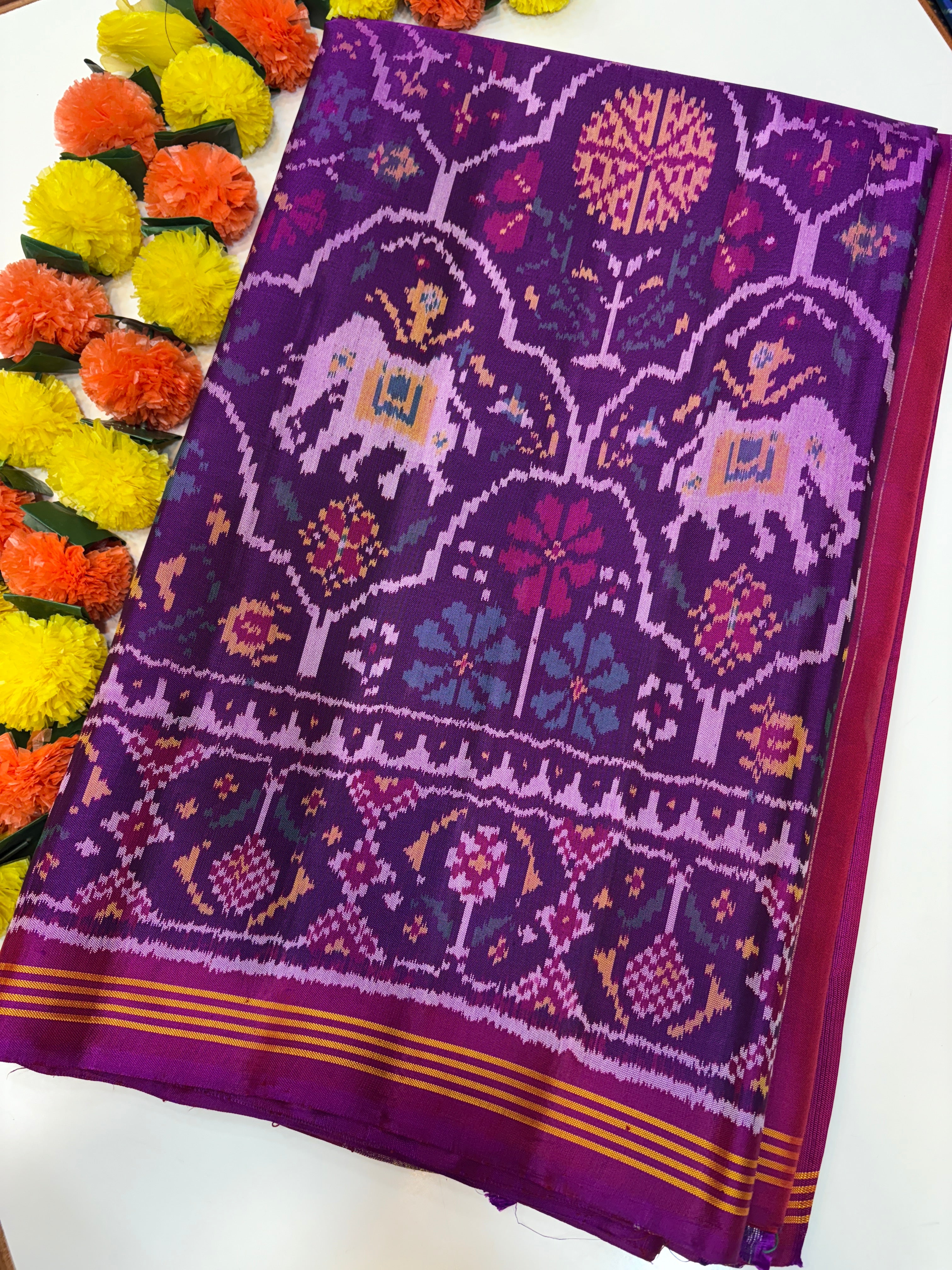 Fusion figures singke ikkat patola saree